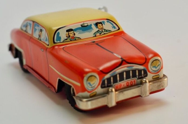 HPZ Prottengeier Sedan with driver 1955 Tinmodel with frictiondrive in original box (5694)